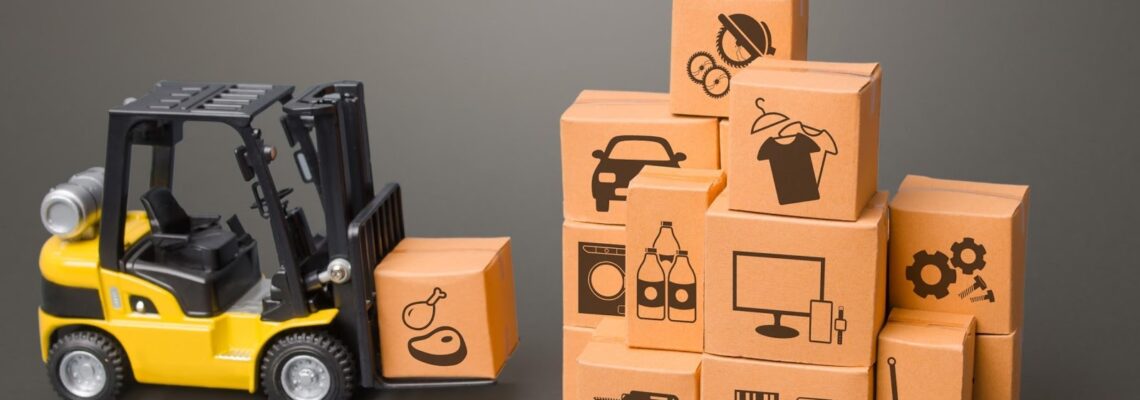 A toy forklift approaches toy boxes that each have symbols on them. Symbols include clothing, electronics, and tools.