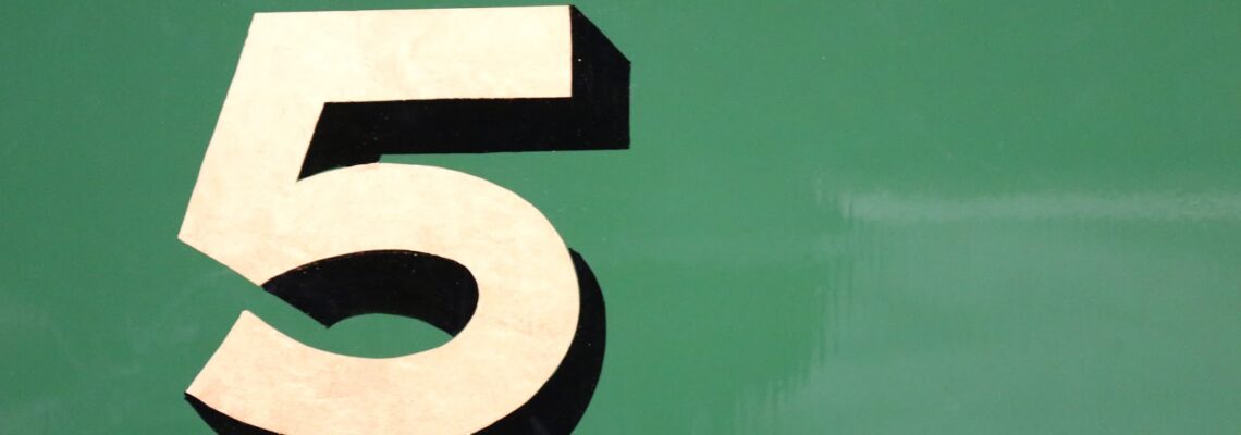 A number five appears on a green background