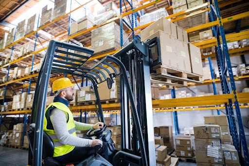 Forklift driver automatically directed to putaway inventory based on IMS programming.